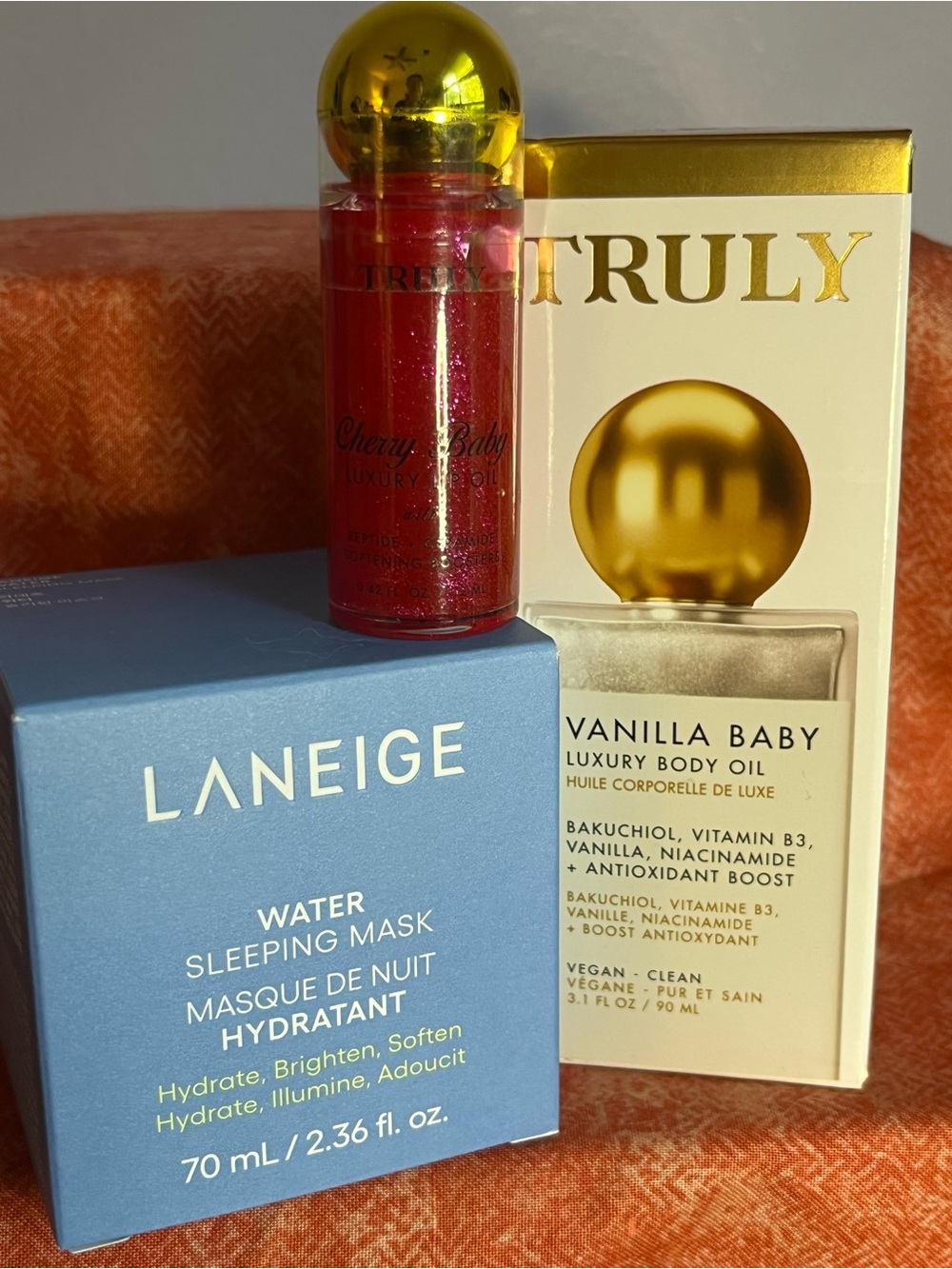 Vanilla Baby Luxury Body Oil, Laneige Sleep Mask, Truly Cherry Bomb